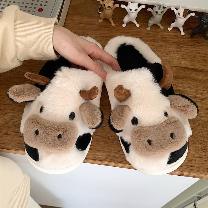 Fluffiga tofflor med söt ko-design