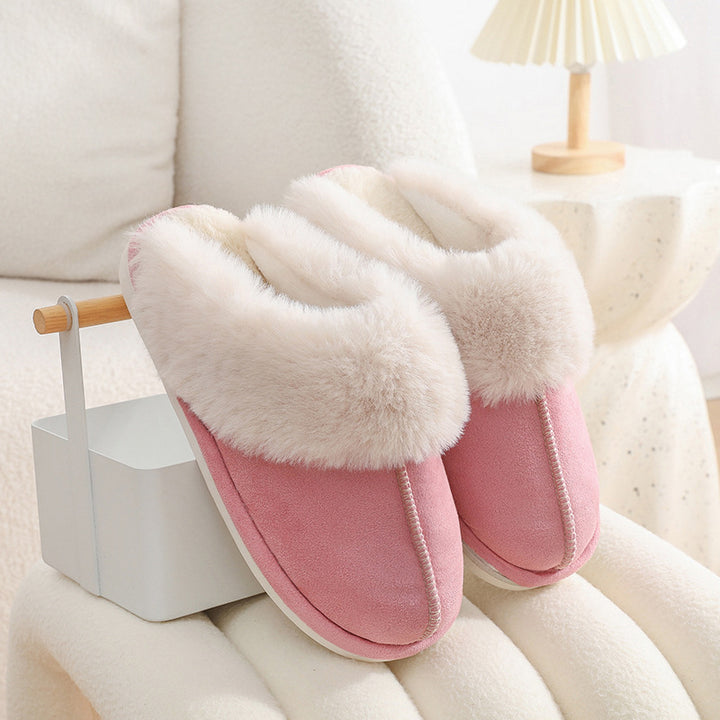Rosa tofflor med fluffig fuskpälskrage
