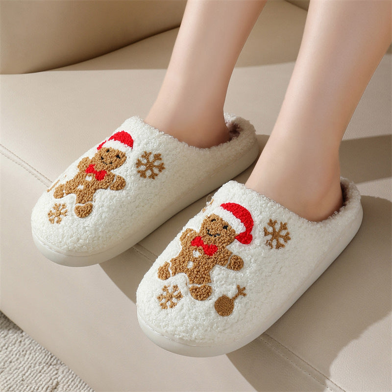 Fluffiga tofflor med broderad pepparkaksgubbe