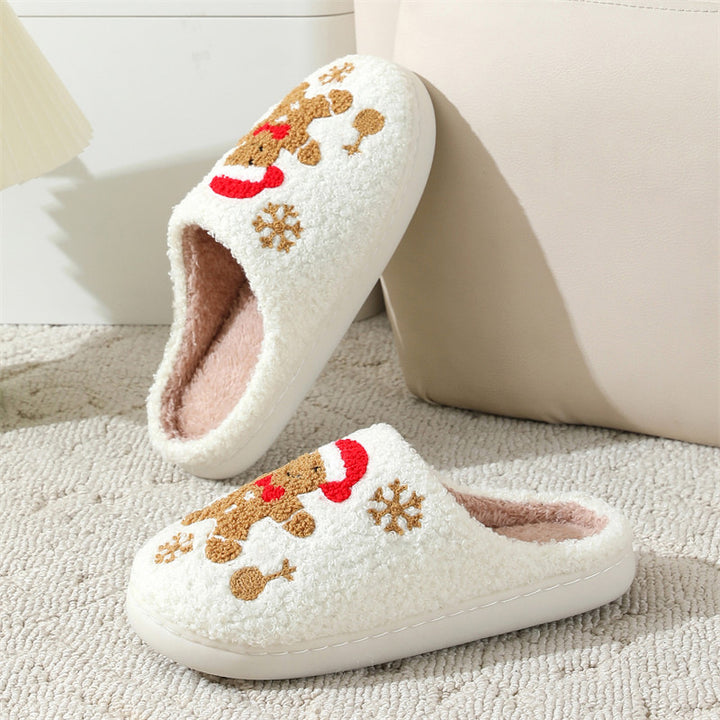 Fluffiga tofflor med broderad pepparkaksgubbe