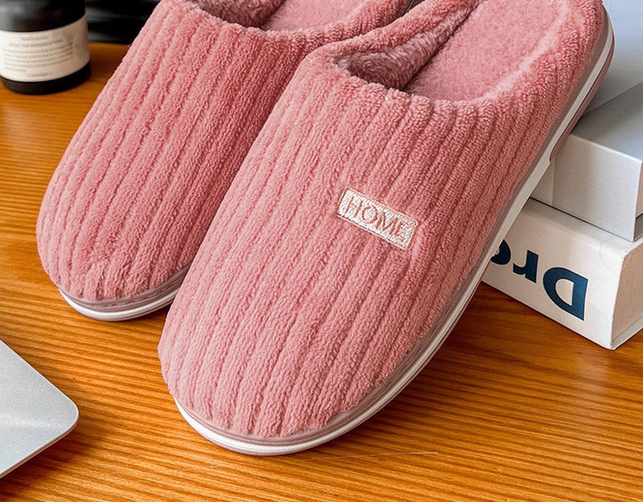 Rosa ribbade plyschtofflor