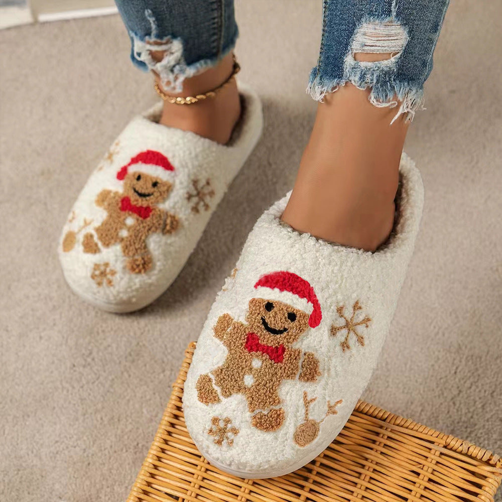 Fluffiga tofflor med broderad pepparkaksgubbe
